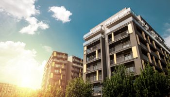 Modern apartment buildings exteriors in sunny day