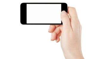 Smartphone in female hand horizontal isolated on white